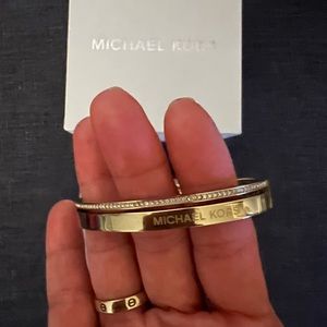 Gold tone bangle by Michael Kors original used